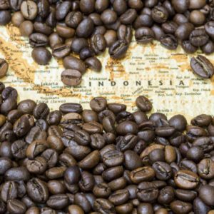 A map of indonesia with coffee beans in the middle.